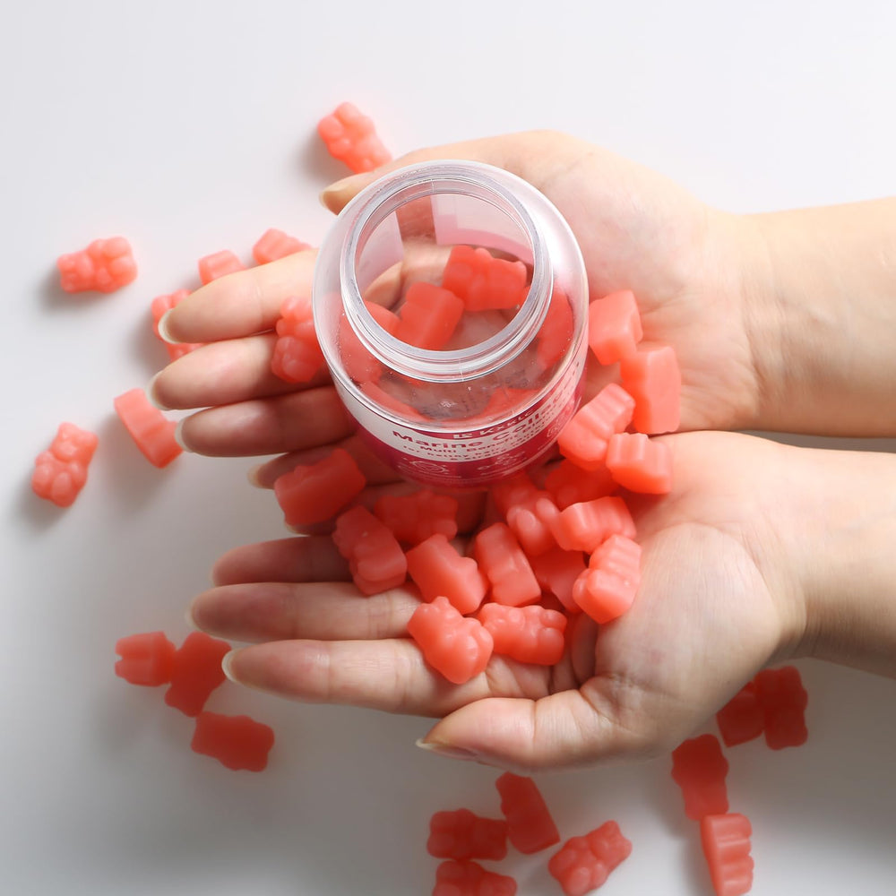 KXKLC gummies arranged with vitamin C and biotin icons evoke daily skincare routine