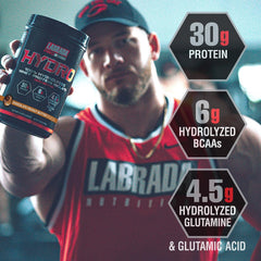 LABRADA Hydro scoop beside glass for a quick protein boost.