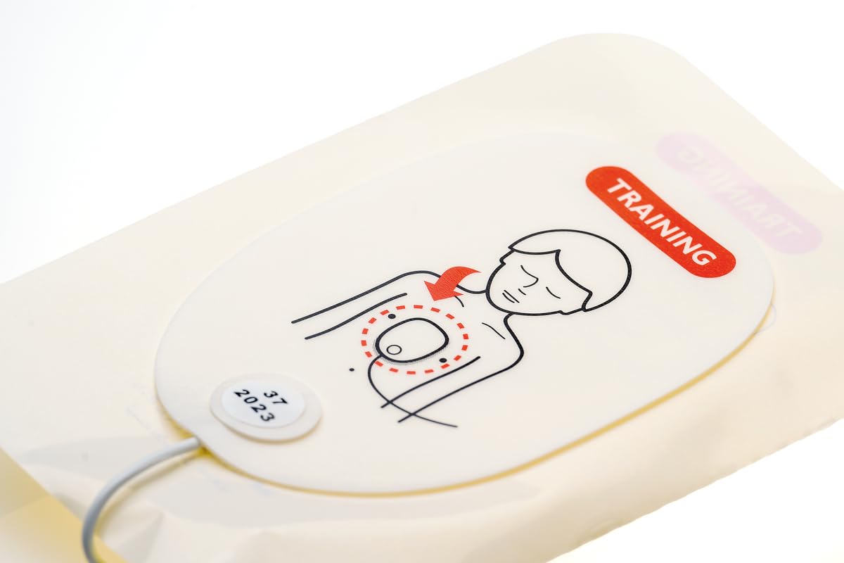 Pads in action during pediatric resuscitation training with Laerdal AED trainers.
