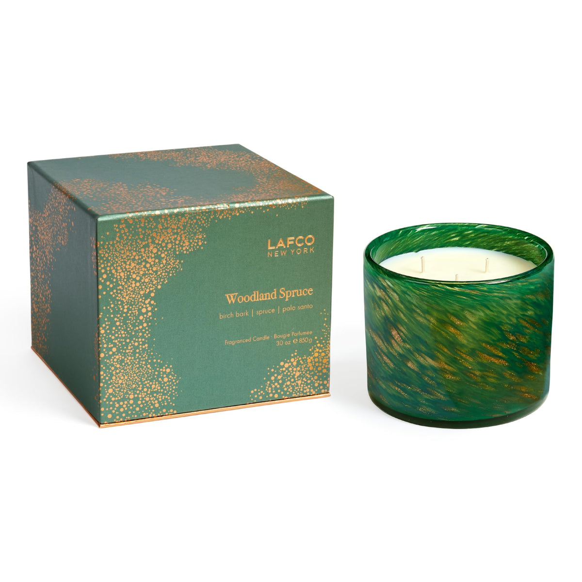LAFCO New York Woodland Spruce 30oz candle in a hand-blown glass vessel for festive ambiance.