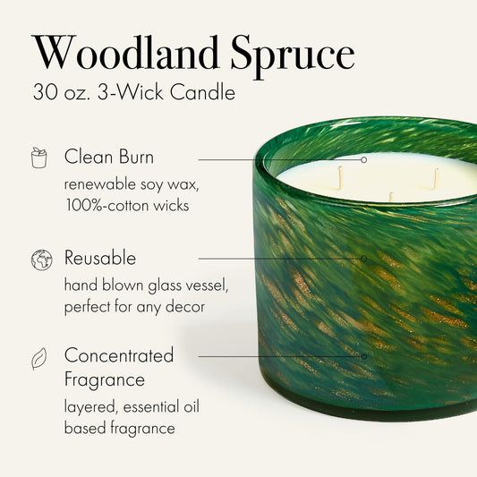 Close-up of warm flame and slow-burning soy wax by LAFCO New York Woodland Spruce.
