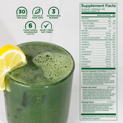 Laird Superfood Daily Greens being stirred in a glass for hydration