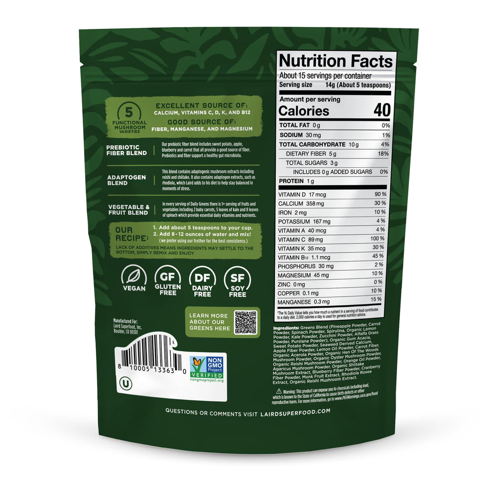 Laird Superfood Daily Greens serving scoop beside glass, highlights prebiotic fiber and vitamins.