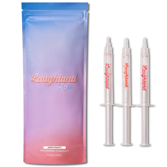 Laughland Super Strength Teeth Whitening Gel tubes for at-home whitening and a brighter smile.