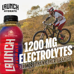 Pouring Launch Hydrate fruit punch to illustrate refreshing hydration on the go.