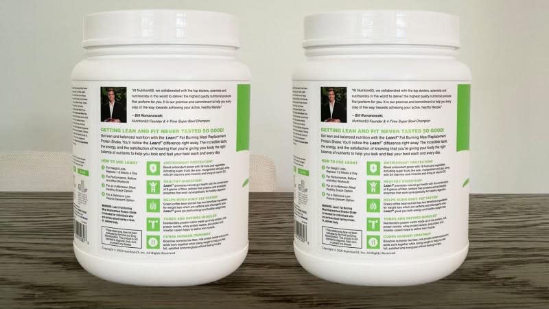 Lean1 vanilla serving scoop displays measured protein and fiber intake options.