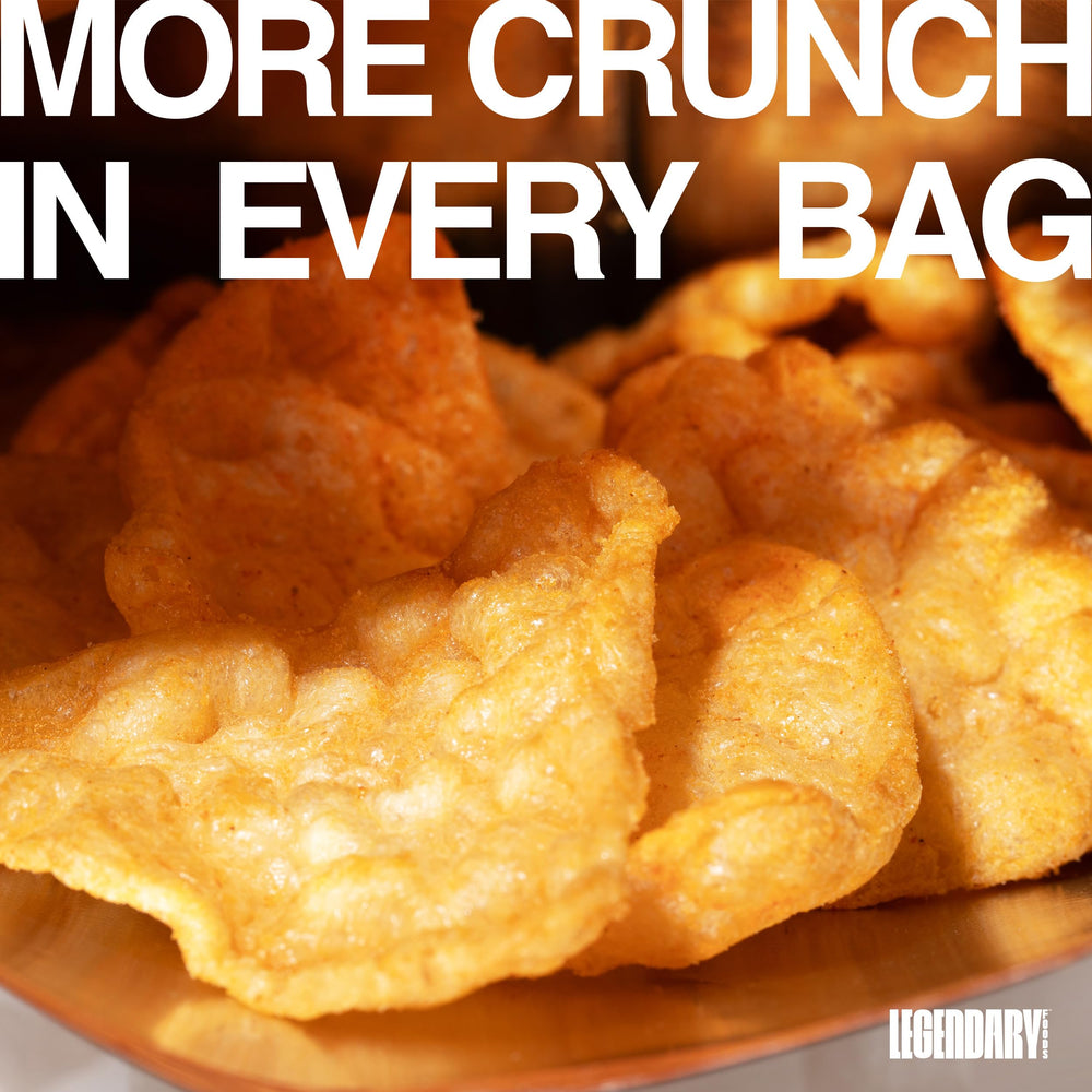 Legendary Foods Cheesy Nacho Protein Chips in a backpack as a convenient snack.