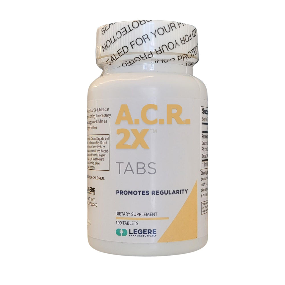 Legere A.C.R 2X cleansing herb bottle on desk supports natural waste movement.