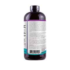 Life Solutions liquid CoQ10 glass showing the supplement.