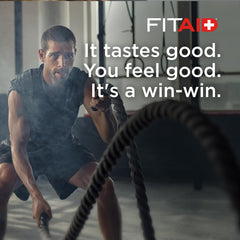 Label highlights vegan and kosher certification on Fitaid bottle.