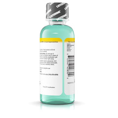 Mouthwash in a glass shows a bright rinse after use.