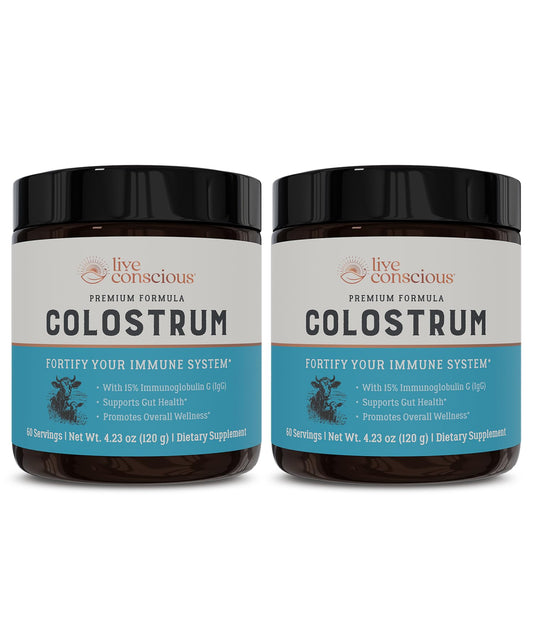 Live Conscious colostrum powder bottle on the counter for daily immune support.