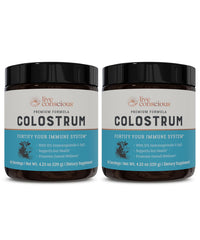 Live Conscious colostrum powder bottle on the counter for daily immune support.