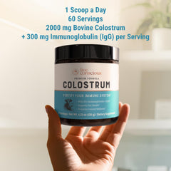 Close-up of Live Conscious colostrum powder label showing grass-fed source.