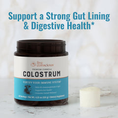 Live Conscious colostrum powder pouring into shaker for easy mixing.
