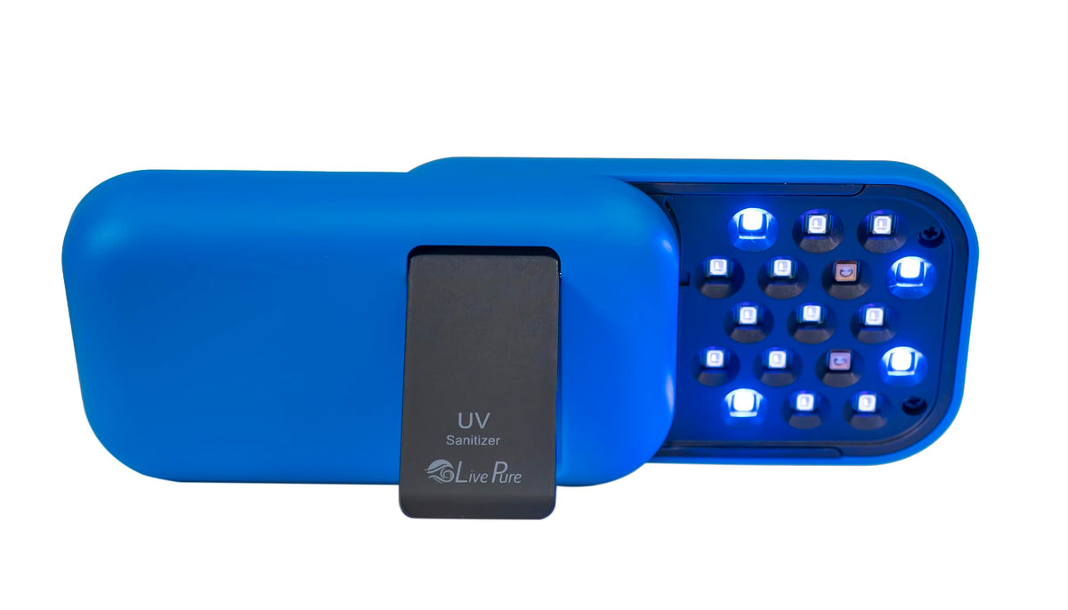 LivePure handheld UV sanitizer shown in hand for quick surface disinfection.