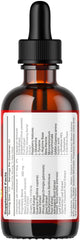 Lifestyle scene with LIVORKA Conolidine Drops beside a notebook