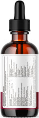 LIVORKA Vitaburn bottle beside a glass of water for easy intake.