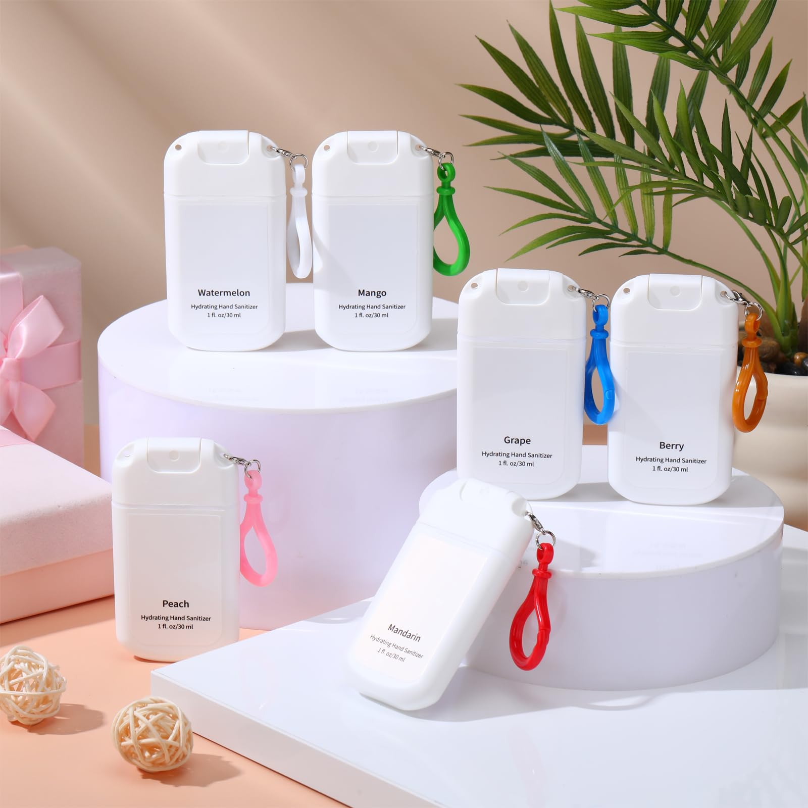 Loopeer mini sanitizer spray keychain in mango scent for post-workout refresh