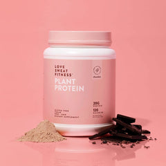 Love Sweat Fitness protein powder scoop highlights quick-mix for smooth shakes
