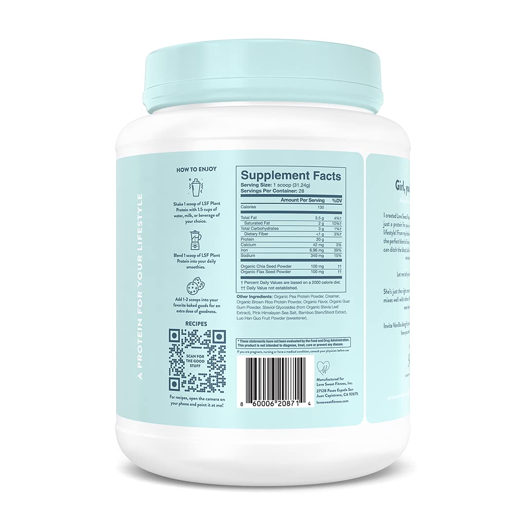 Love Sweat Fitness vanilla protein shake glass with whipped topping highlights creamy texture.
