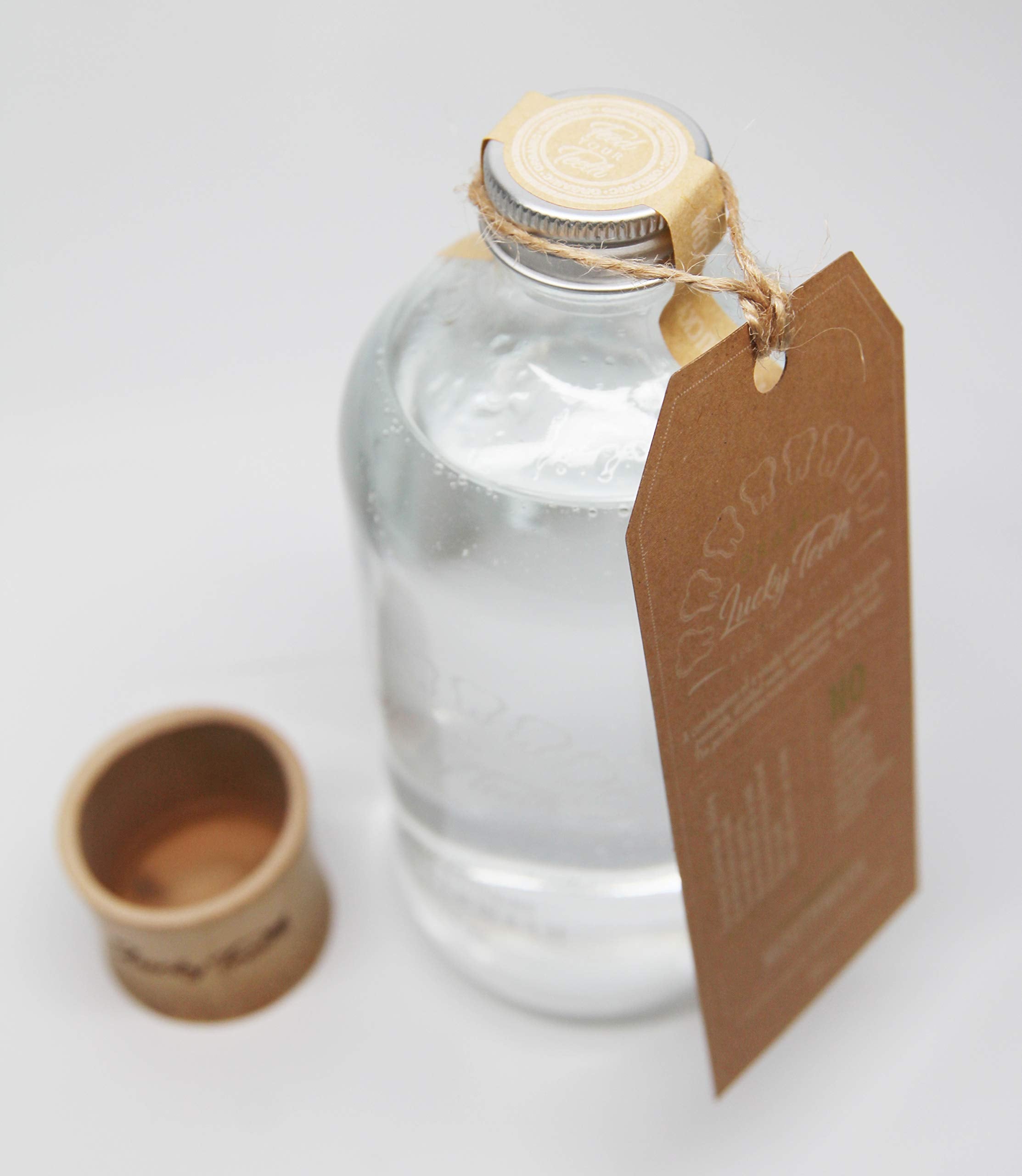 Lucky Teeth mouthwash glass jar packaging emphasizing zero waste and eco-friendly design