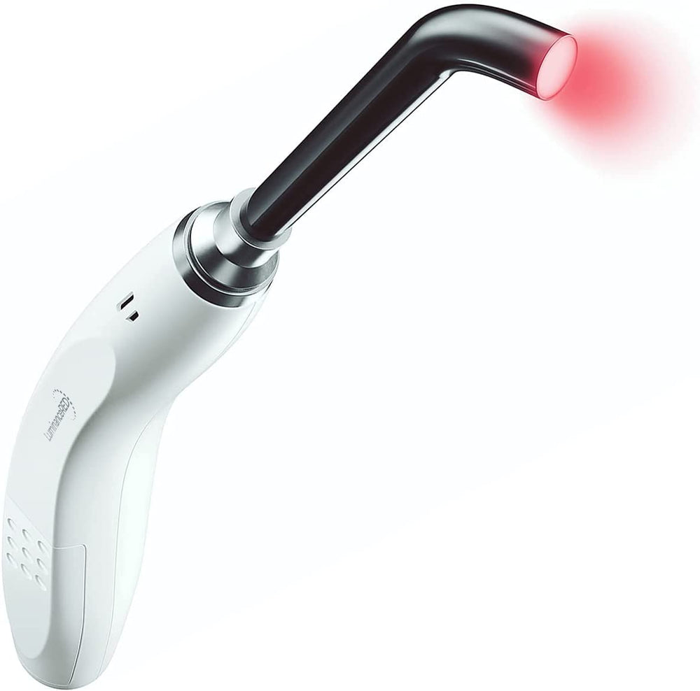 Luminance Red lip sore device handheld use demonstrates simple, hands-on application.