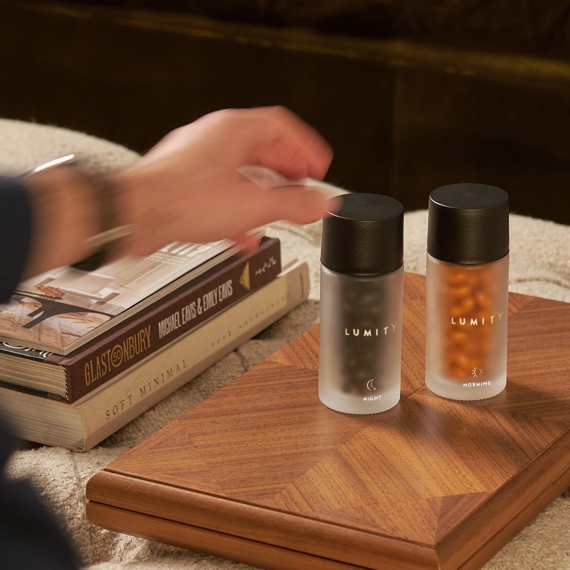 Lumity morning capsules close-up highlighting vitamins for energy and mental clarity.
