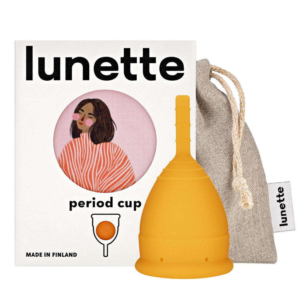 Lunette Period Cup orange packaging highlights eco-friendly design for sustainable care.
