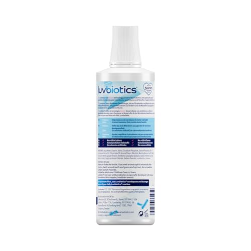 LuvBiotics Mouthwash bottle pour action demonstrates easy dosing for daily oral care.