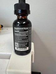LYFE tincture drops being poured for quick focus and fast absorption