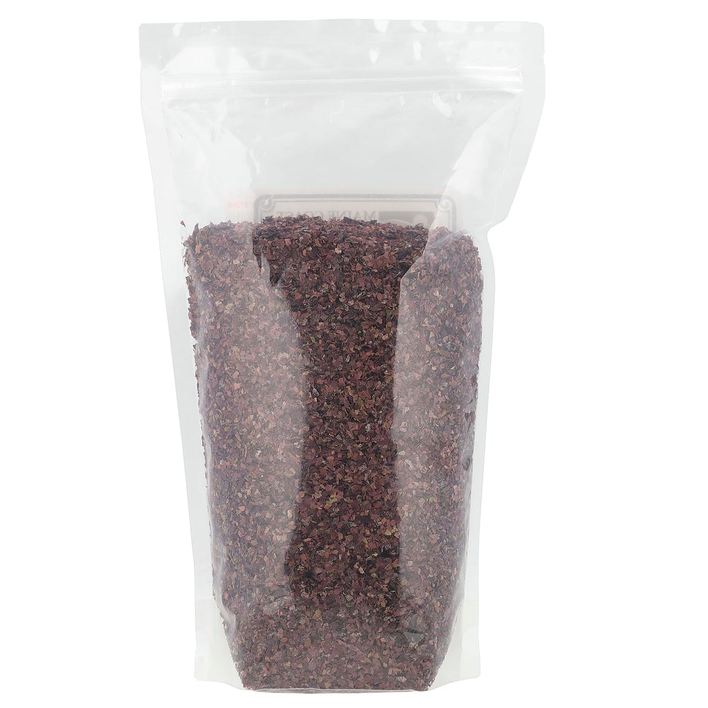 Maine Coast Dulse Flakes close-up, perfect for sandwiches and sauces with mineral richness.