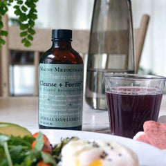 A glass of water beside Cleanse + Fortify suggesting routine over 8-16 days