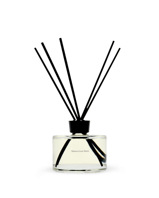 Maison Louis Marie No.13 Nouvelle Vague diffuser bottle reveals bright citrus and florals for a vibrant room.