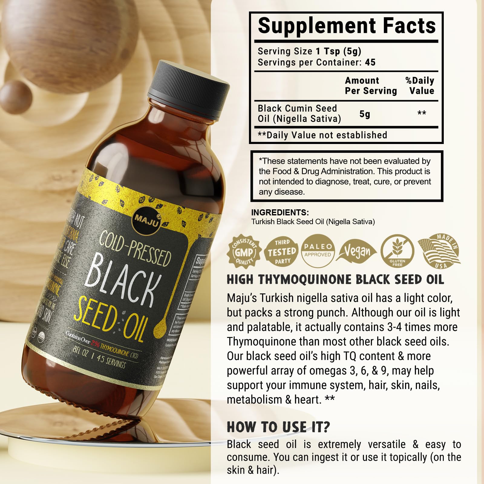 MAJU Black Seed Oil pour action shows easy dosing for everyday wellness.