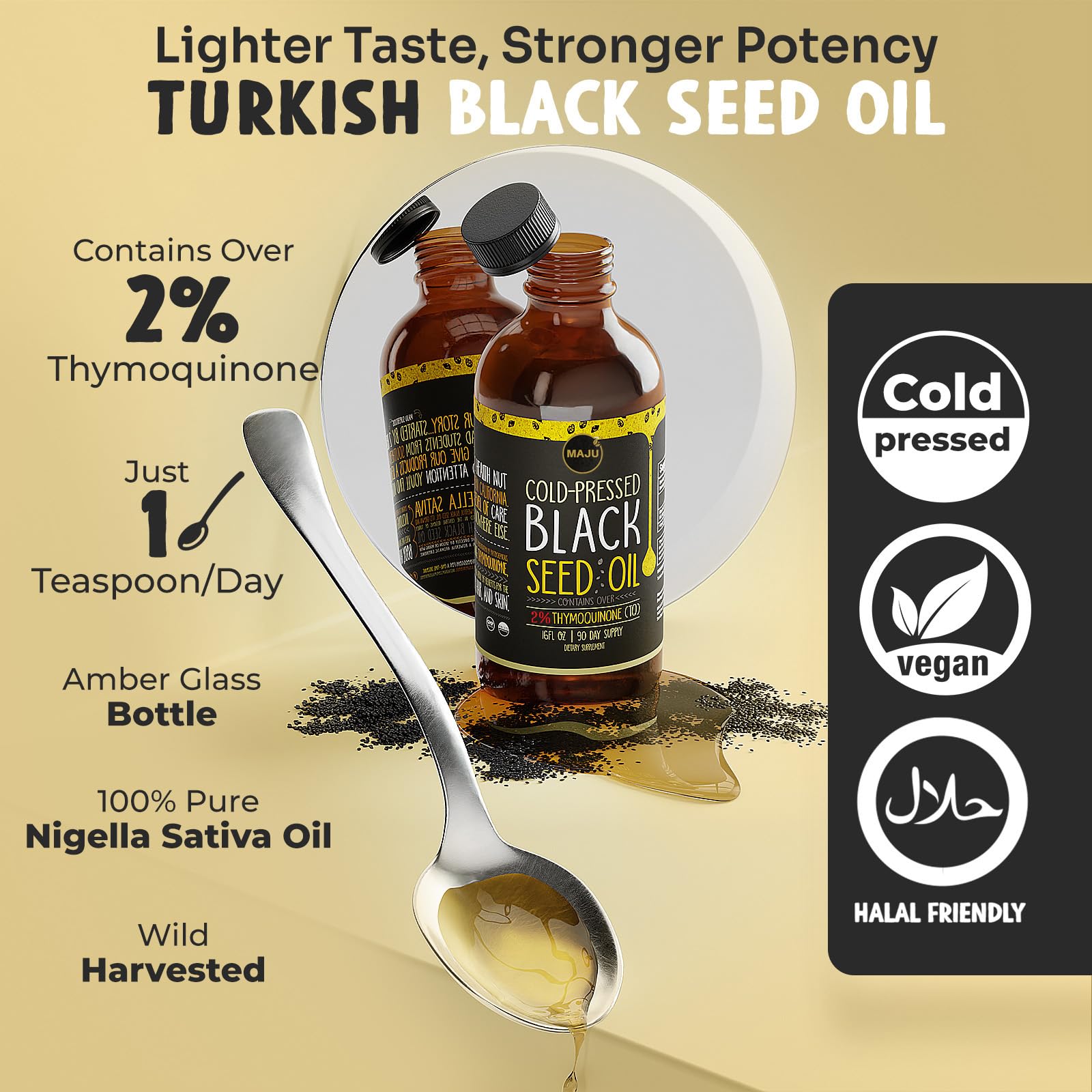 MAJU Black Seed Oil glass bottle closeup reveals amber glass and premium quality.