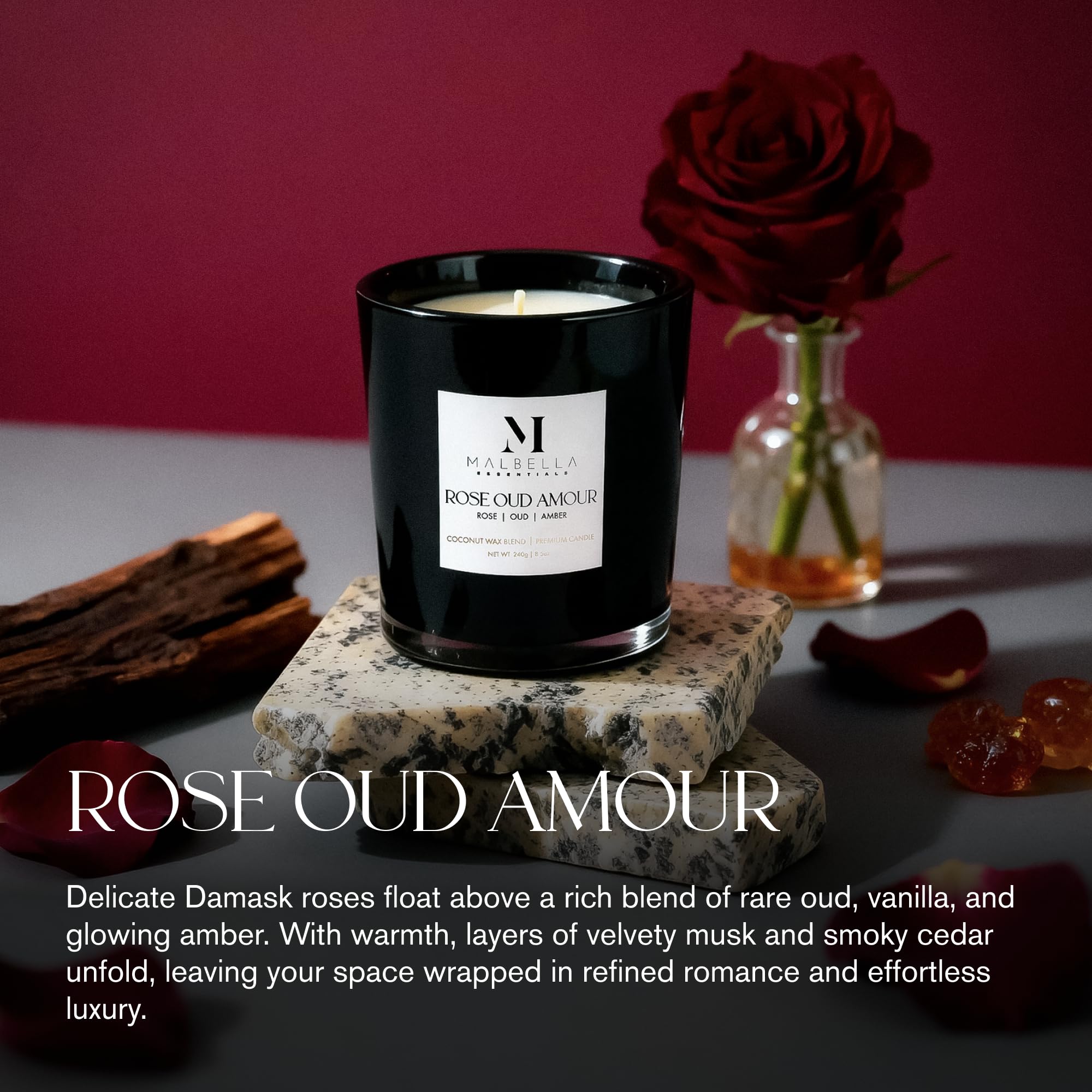 Malbella Essentials Rose Oud Amour candle in black vessel adds a modern decorative glow.