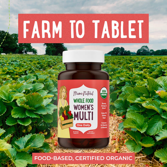Mama Natural Organic Women's Multivitamin tablet close-up showing one-a-day vegan design.