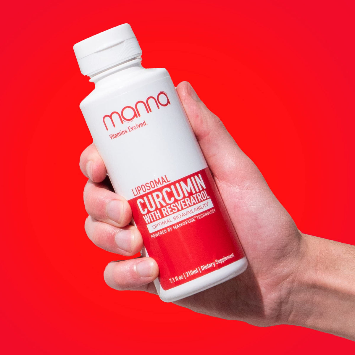 Manna Vitamins Evolved curcumin-resveratrol liquid bottle for daily wellness support