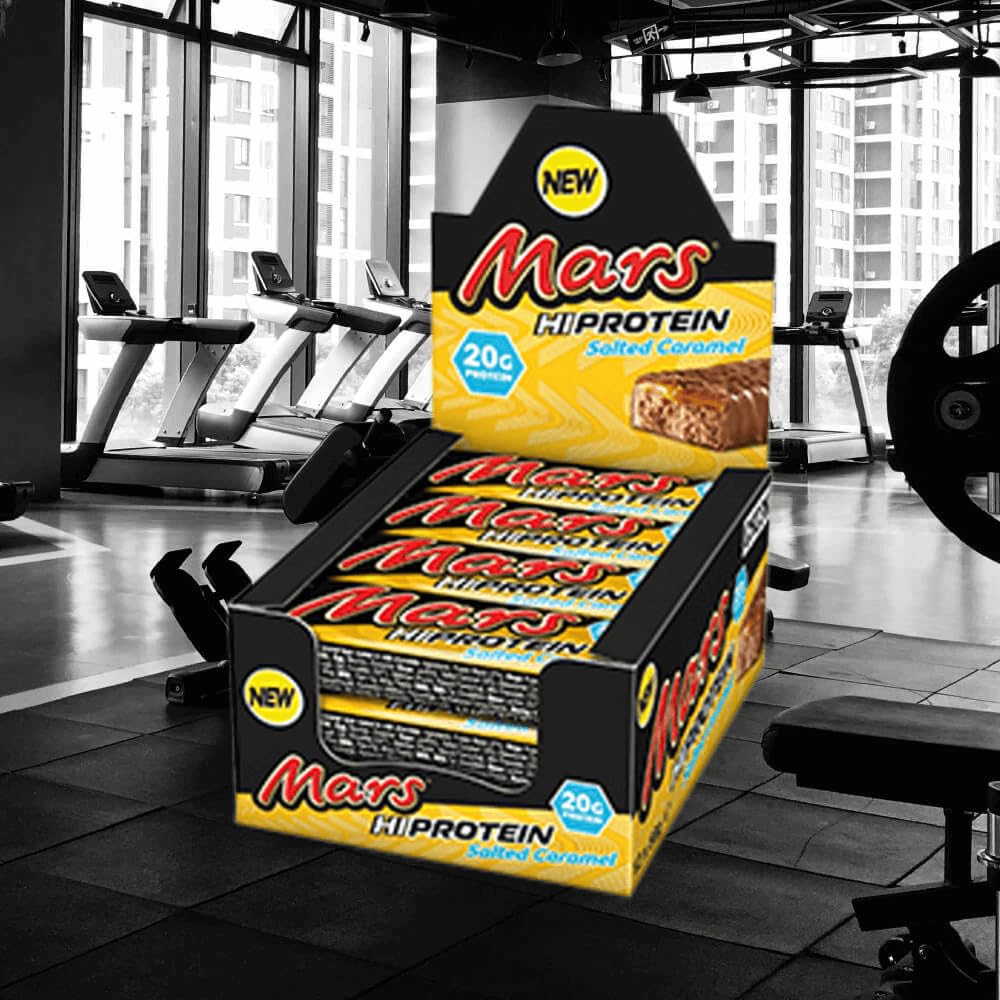 Mars Hi Protein Bar Salted Caramel cross-section reveals chewy interior and coating.