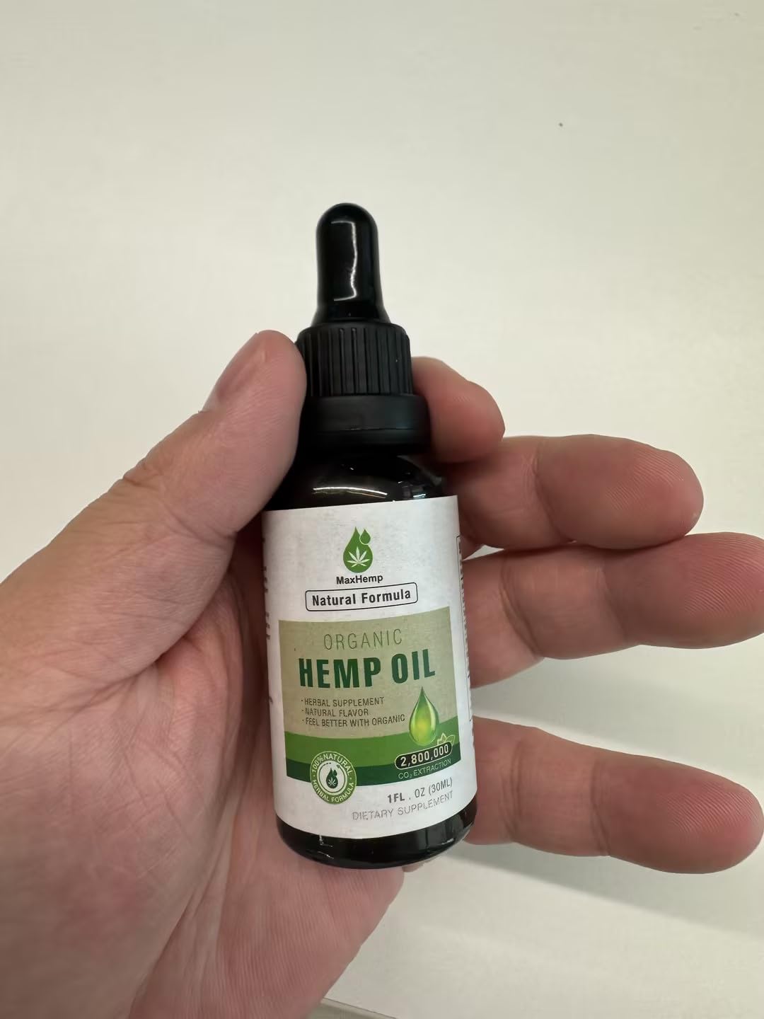 MaxHemp 2-pack hemp oil bottle with dropper promotes daily wellness.