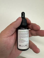 MaxHemp label close-up showing natural ingredients and purity.