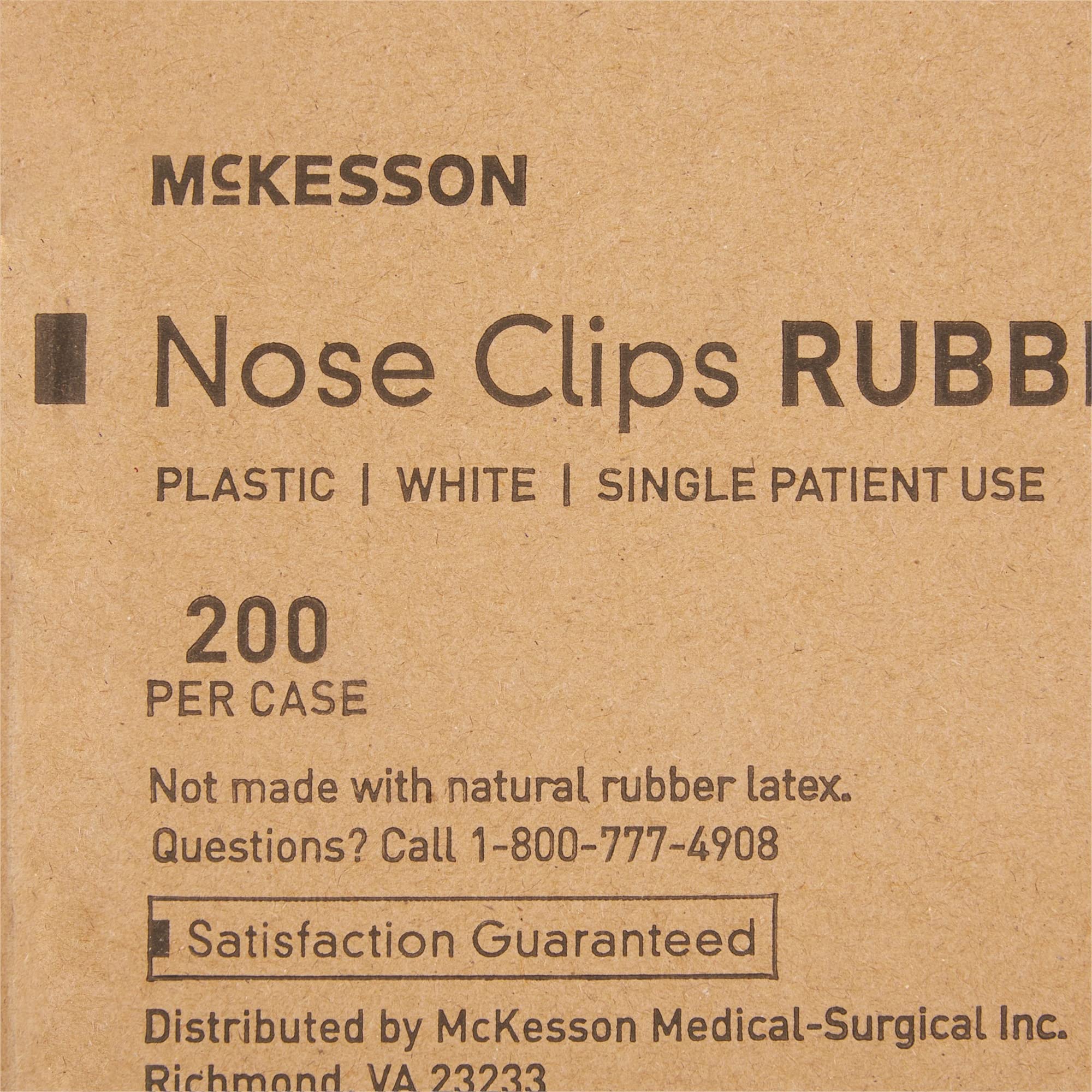 McKesson nose clips with large white pads reduce air leakage during testing.