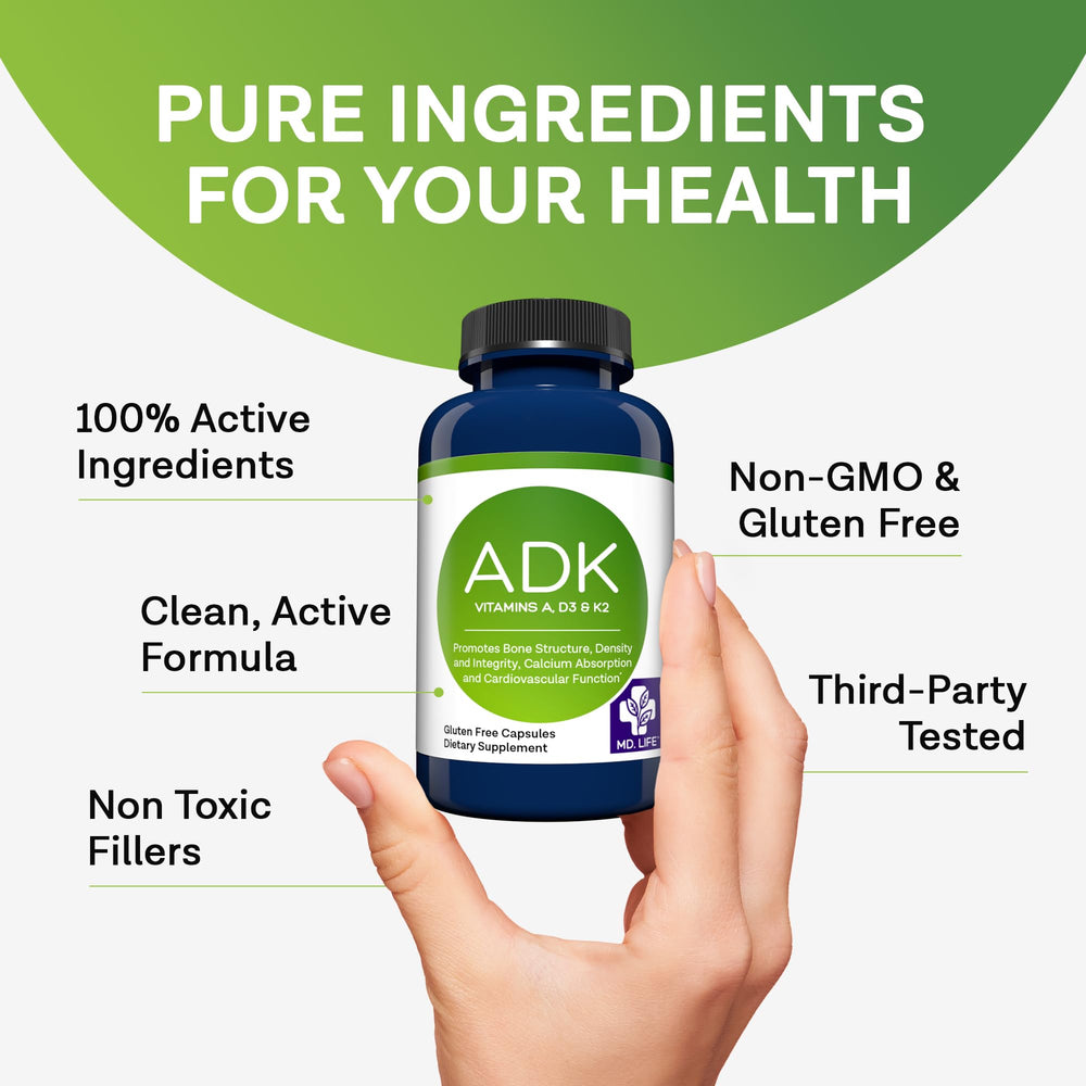MD.LIFE ADK bottle beside glass and capsules in a healthy setup
