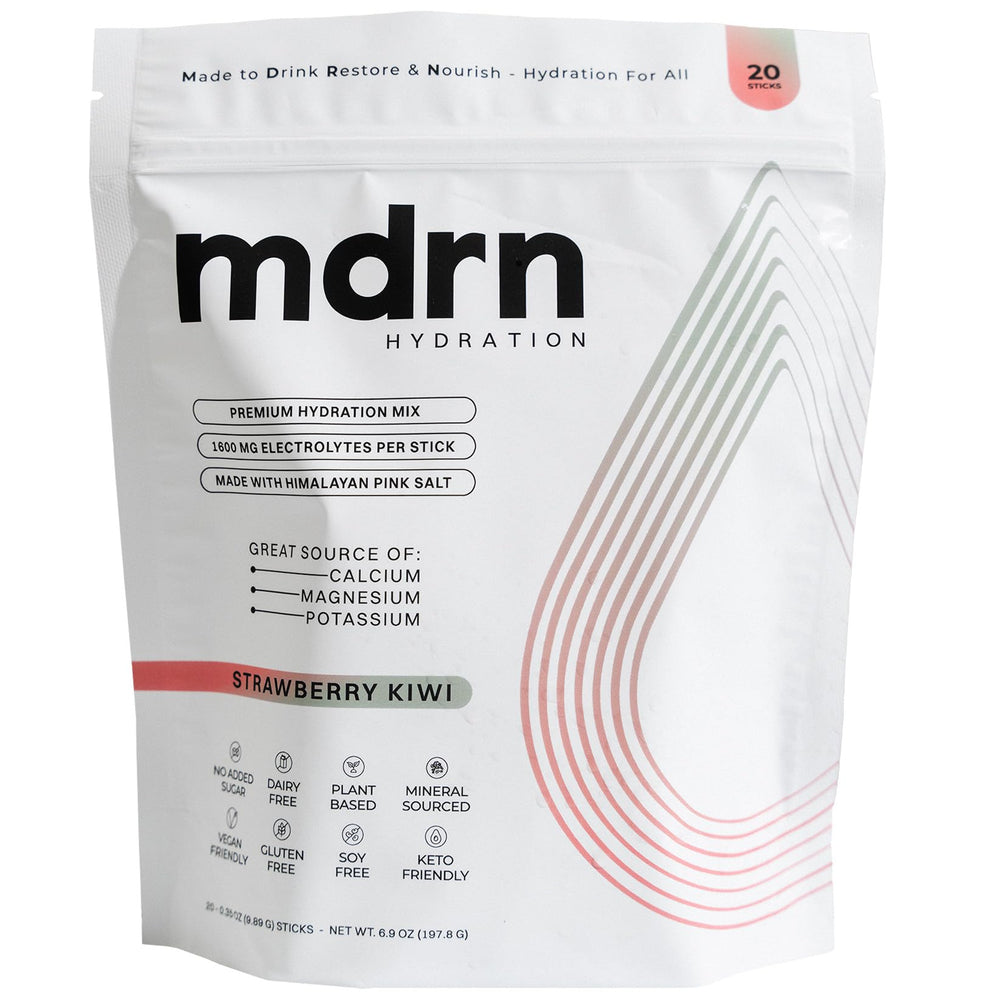 MDRN Hydration bottle pour demonstrates quick electrolyte delivery during workouts.