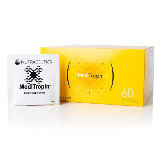 MediTropin orange effervescent sachets dissolving in water for a refreshing daily ritual