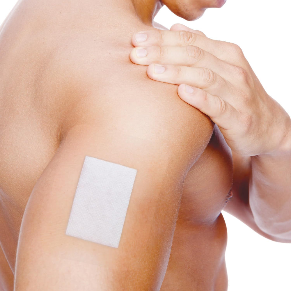 MEDSTOCK Transparent Island Dressing wound-pad close-up shows non-woven pad protection.