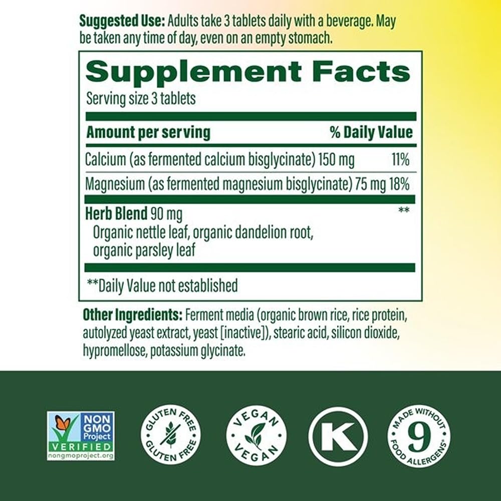 MegaFood Calcium Magnesium tablets closeup—chelated magnesium glycinate for muscle relaxation.