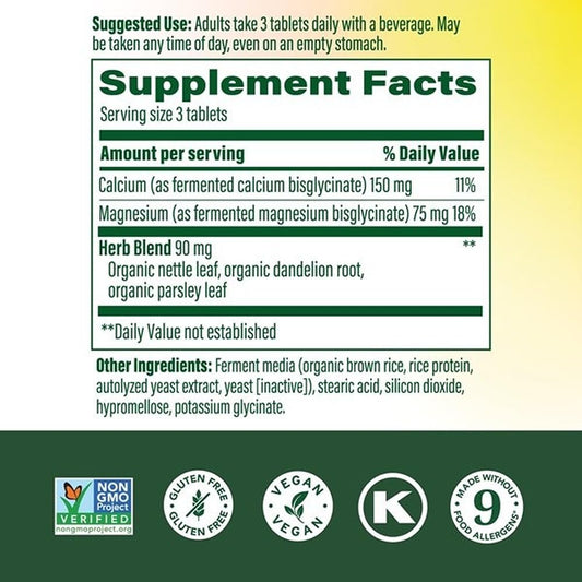 MegaFood Calcium Magnesium tablets closeup—chelated magnesium glycinate for muscle relaxation.