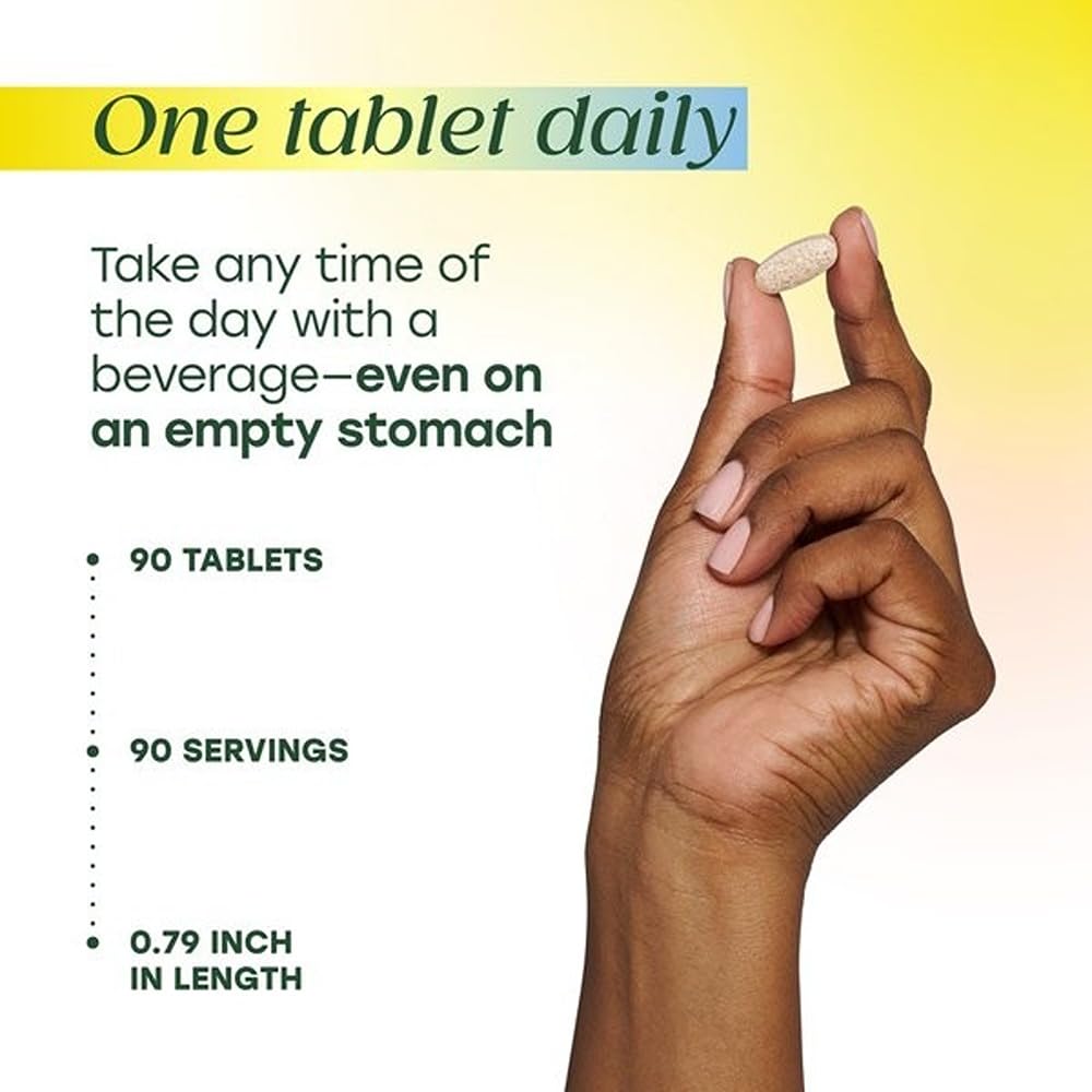 MegaFood Complex C bottle ready for a daily routine with a glass of water.